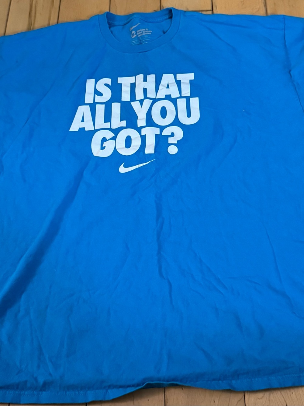 Nike Men’s Bright Blue Graphic Tee with White Slogan